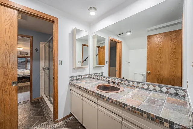 a balcony with trees in front of it