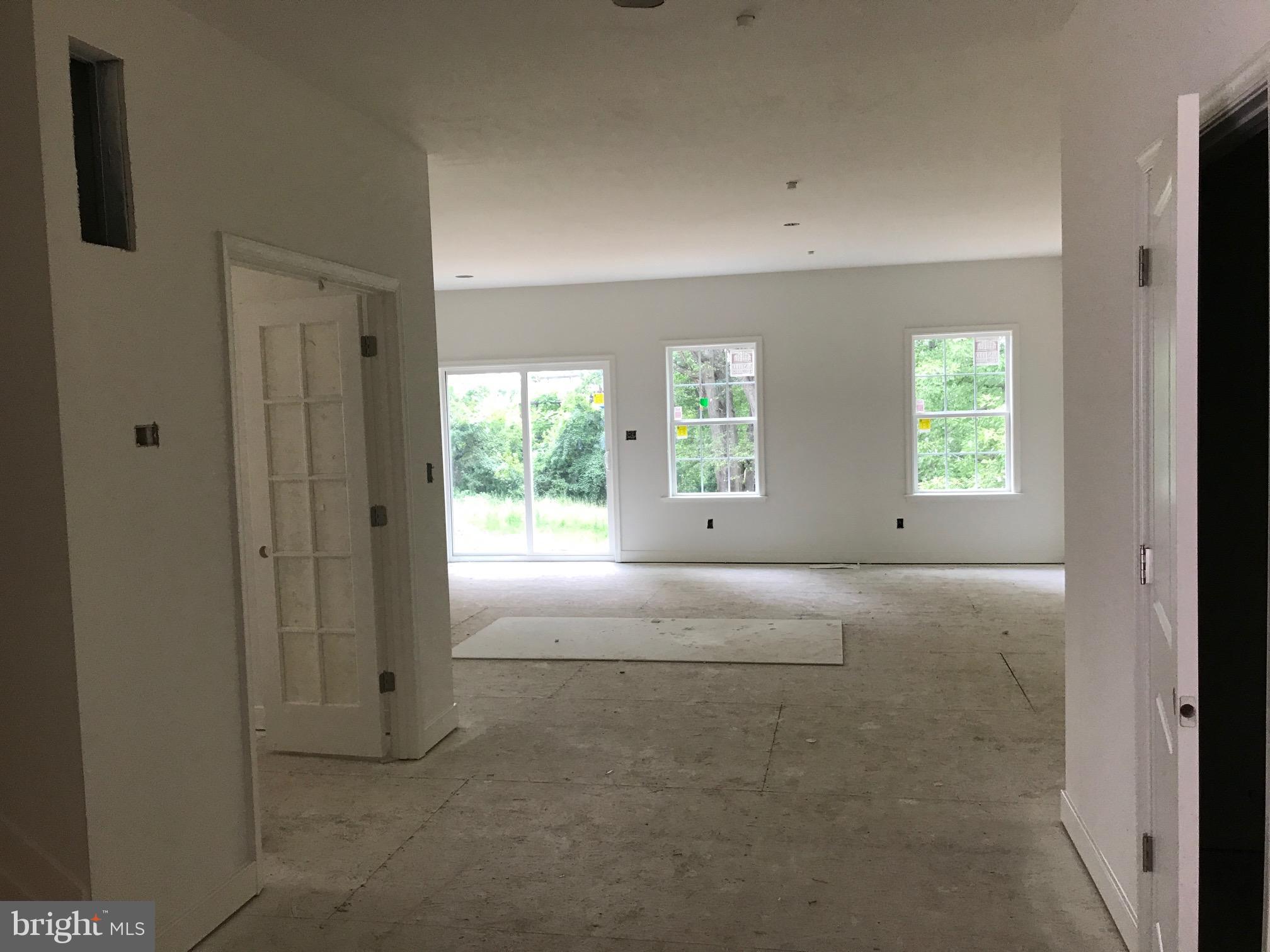 8006 Hillendale Road Parkville, MD 21234 - Photo 6 of 16 a view of an empty room with window