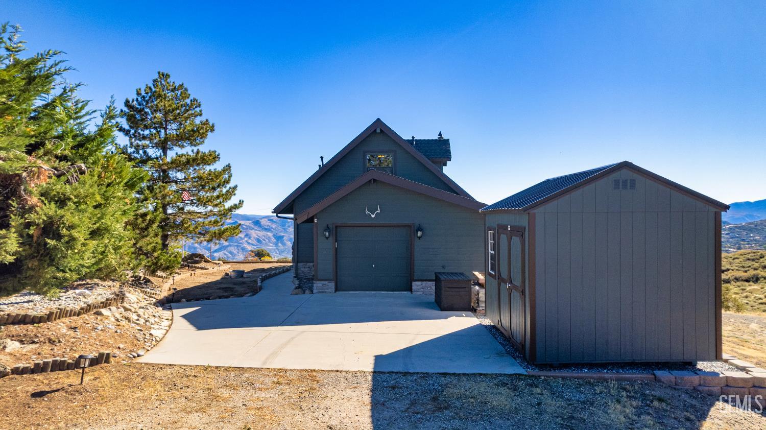 Undisclosed Address Tehachapi, CA 93561 - Photo 29 of 42 a view of a house with a yard