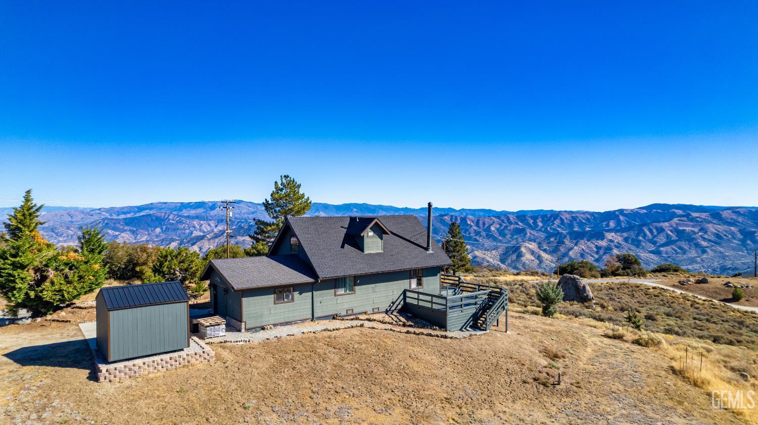 Undisclosed Address Tehachapi, CA 93561 - Photo 30 of 42 a view of a terrace with a flat screen tv