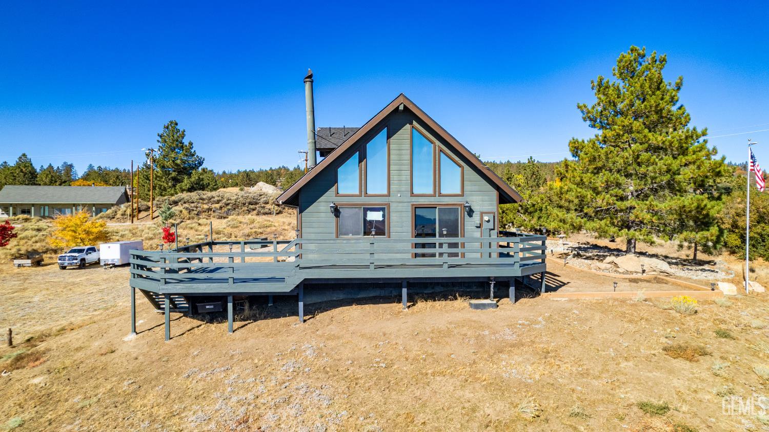 Undisclosed Address Tehachapi, CA 93561 - Photo 33 of 42 a view of a house with wooden deck and sitting area