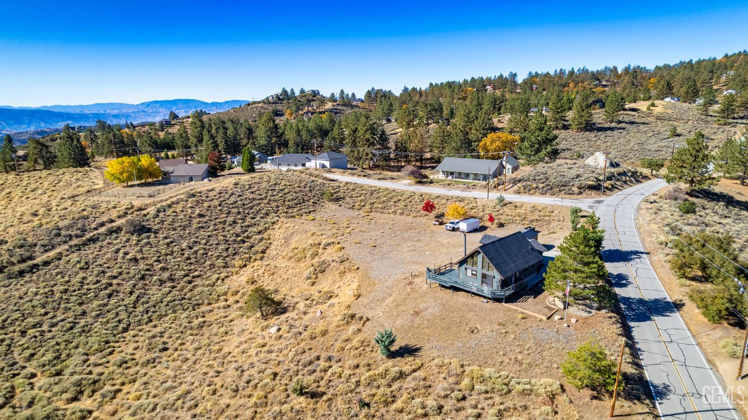 Undisclosed Address Tehachapi, CA 93561 - Photo 36 of 42 a view of a road with a building in the background