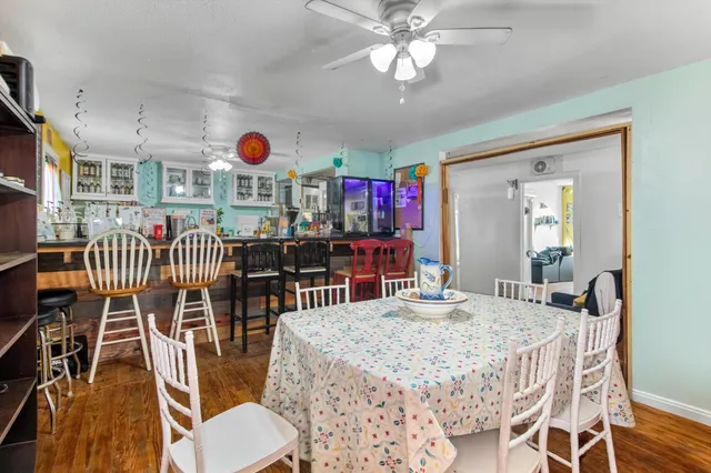 a view of a dining room with furniture