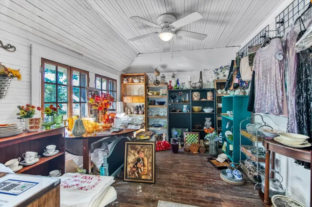 a room with lots of wooden furniture