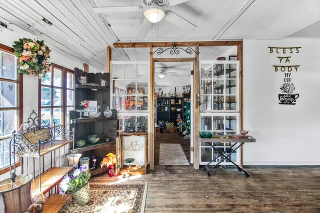 a view of livingroom with furniture and floor to ceiling window