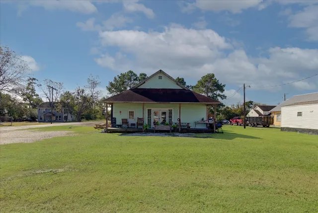 an aerial view of a house with a garden