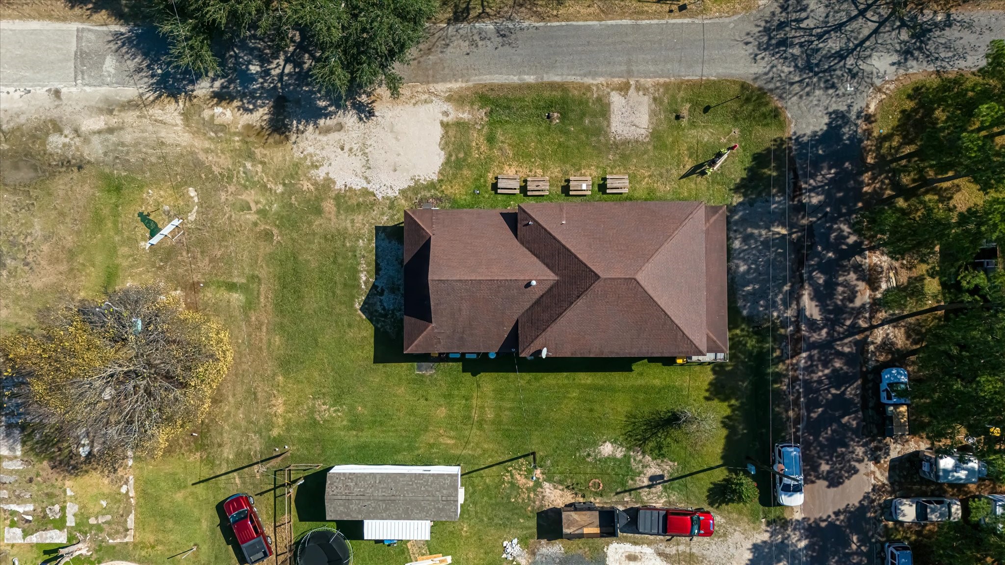 411 Willcox Street Anahuac, TX 77514 - Photo 50 of 50 an aerial view of multiple houses with yard