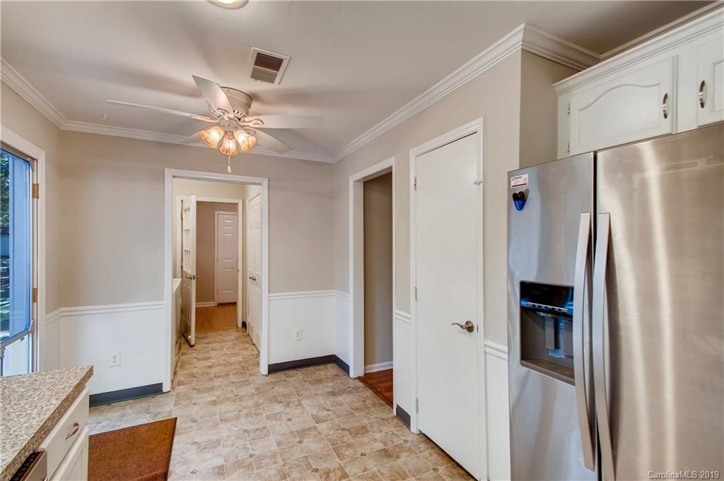 503 Southland Road Huntersville, NC 28078 - Photo 11 of 26 a view of a kitchen with refrigerator and cabinet