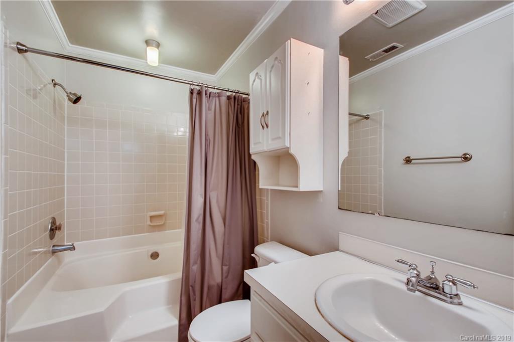 503 Southland Road Huntersville, NC 28078 - Photo 14 of 26 a bathroom with a sink toilet and shower
