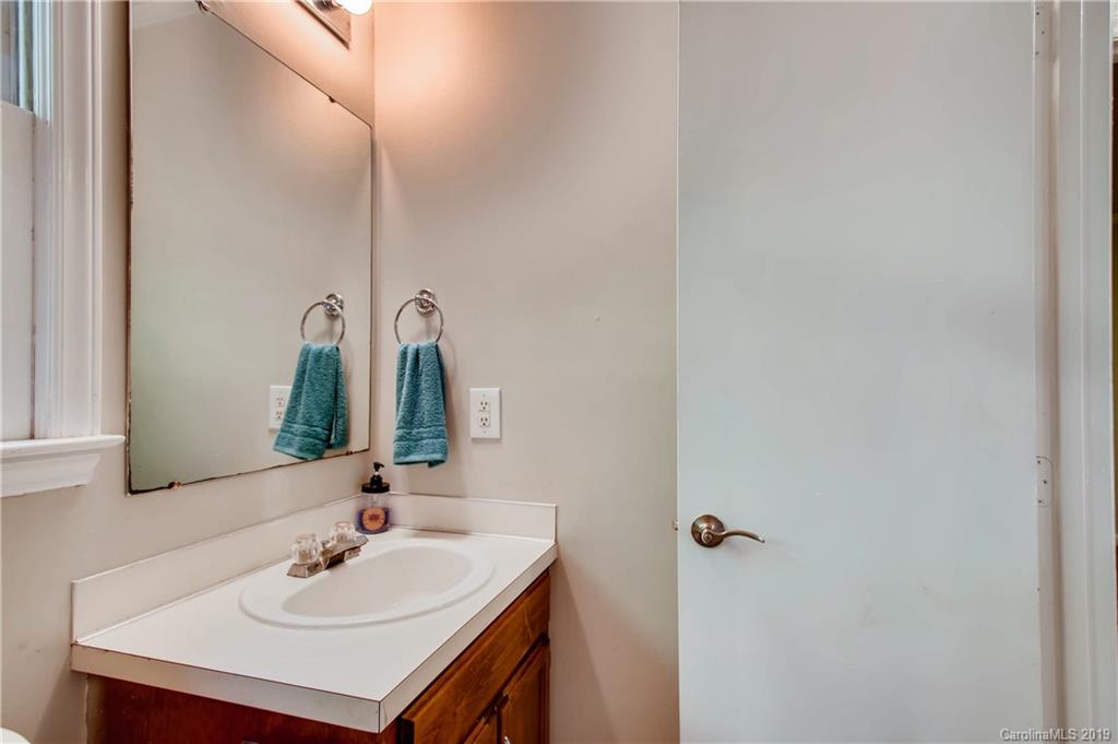 503 Southland Road Huntersville, NC 28078 - Photo 19 of 26 a bathroom with a sink and a mirror