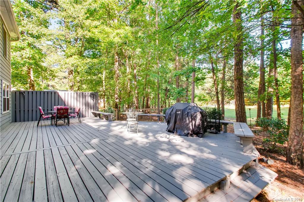 503 Southland Road Huntersville, NC 28078 - Photo 23 of 26 a view of backyard with deck and outdoor seating