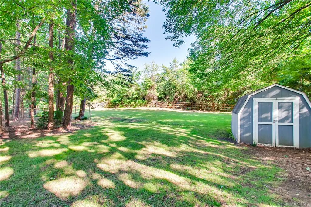 503 Southland Road Huntersville, NC 28078 - Photo 5 of 26 a view of a house with a backyard