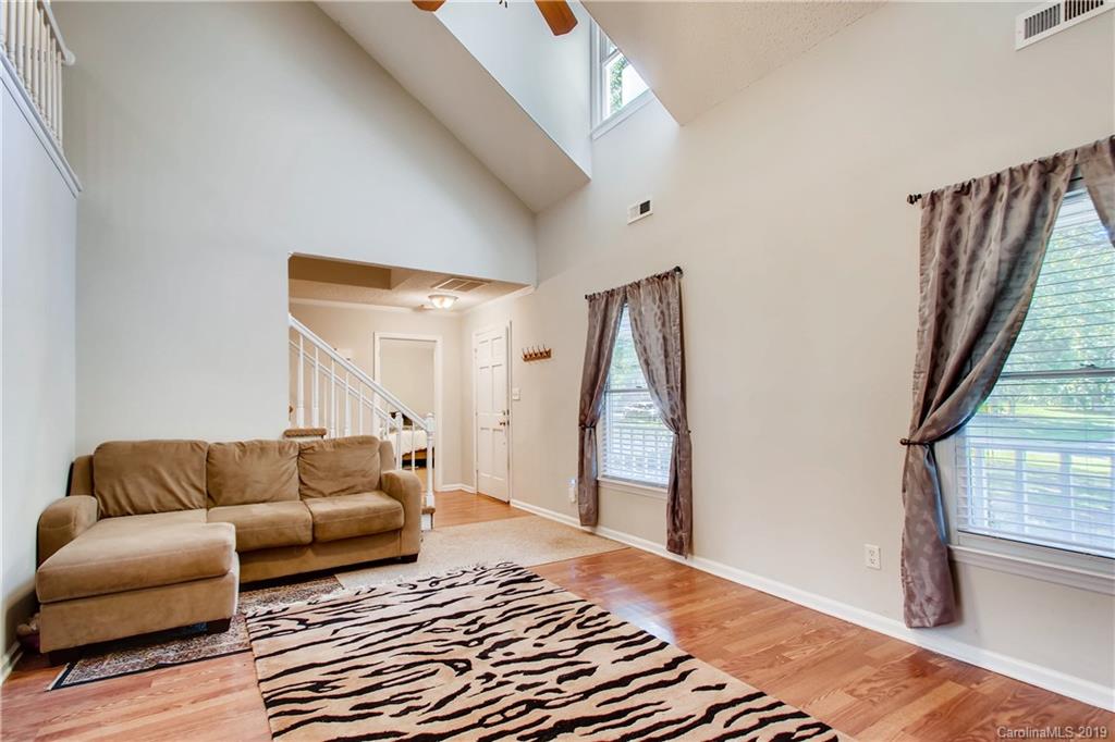 503 Southland Road Huntersville, NC 28078 - Photo 8 of 26 a living room with furniture and a rug