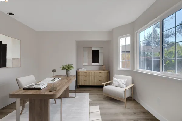 a living room with furniture and window