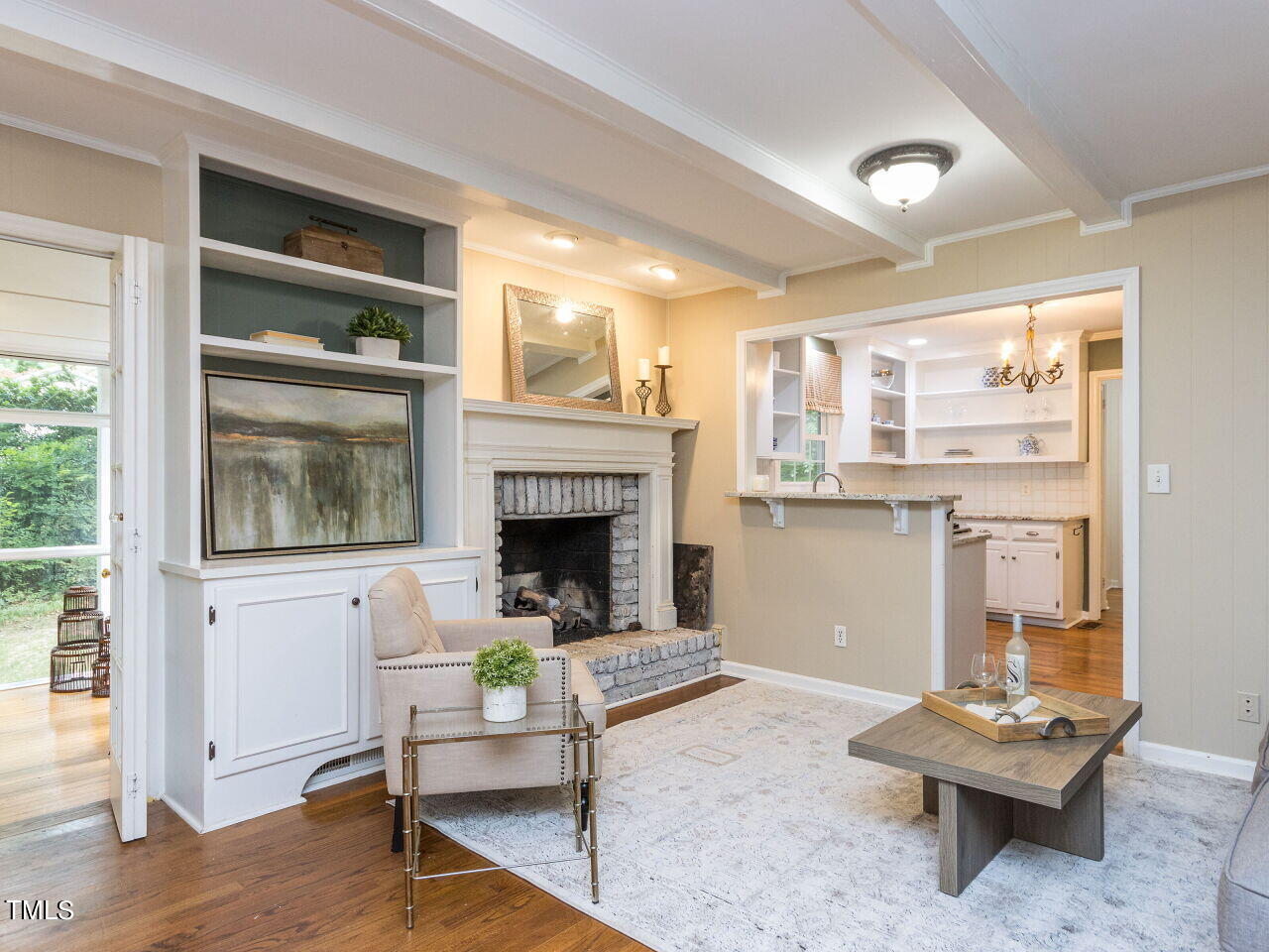 608 Ortega Road Raleigh, NC 27609 - Photo 6 of 34 Cozy family room flows to kitchen!