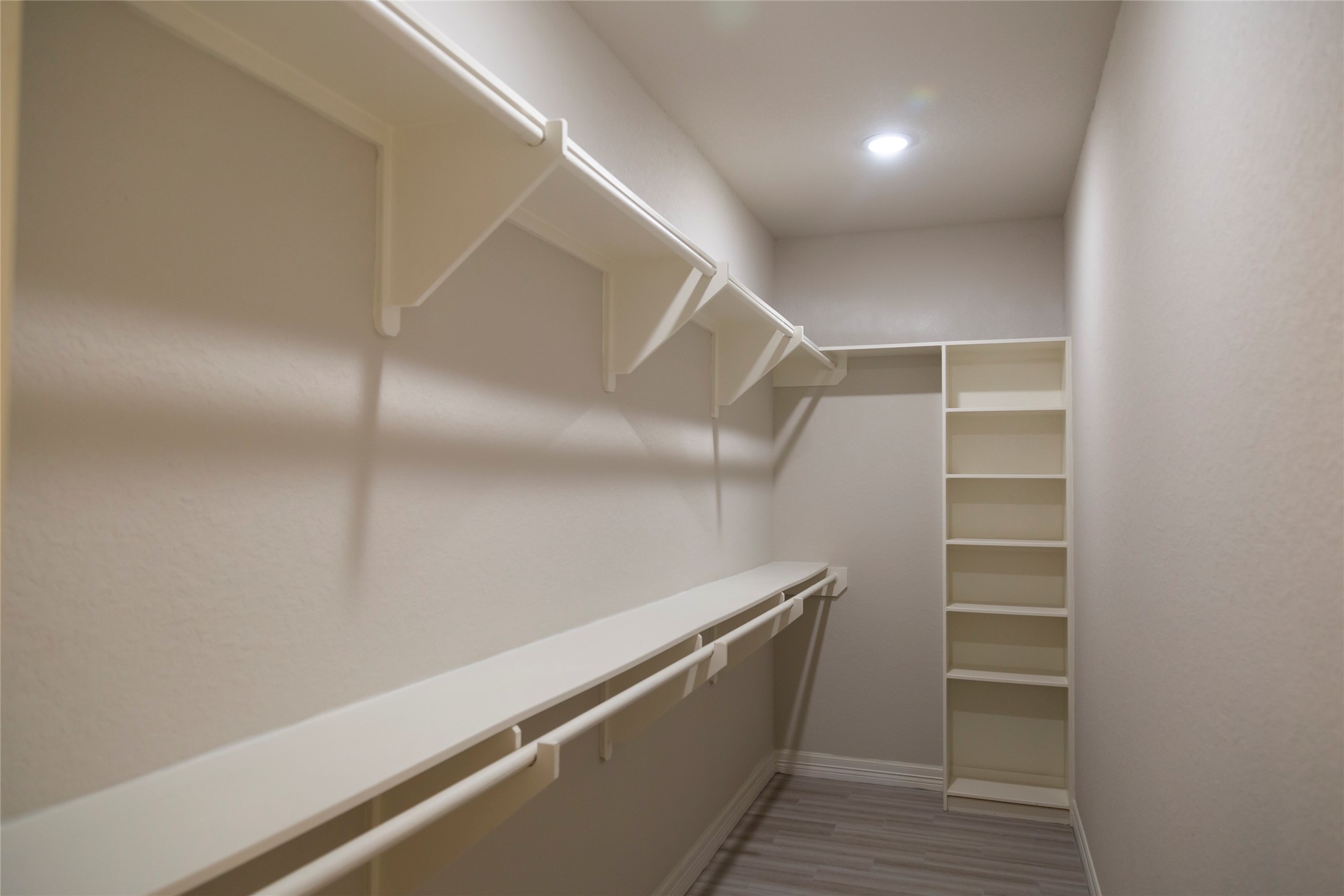 19 Blue Bonnet Drive Trinity, TX 75862 - Photo 37 of 50 The other end of the primary closet 16'x10