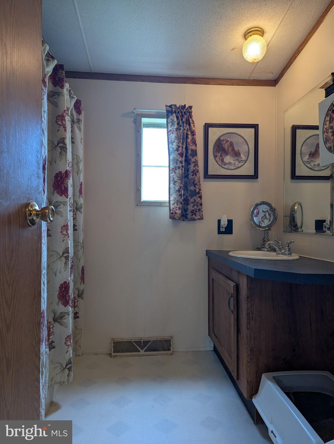 2525 Baltimore Boulevard Finksburg, MD 21048 - Photo 14 of 25 a view of a hallway with paintings on the wall