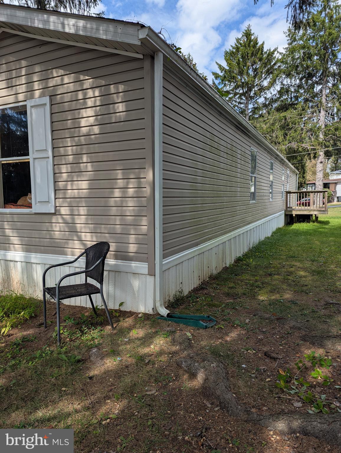 2525 Baltimore Boulevard Finksburg, MD 21048 - Photo 2 of 25 a backyard of a house with table and chairs