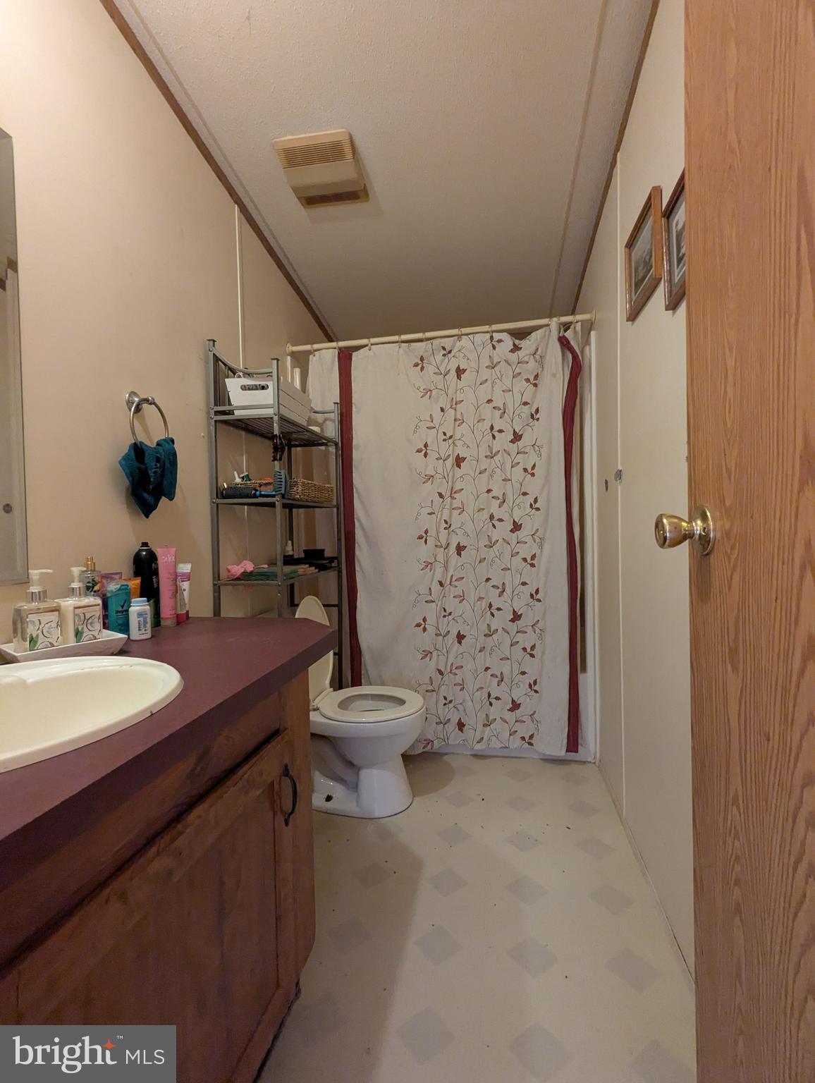 2525 Baltimore Boulevard Finksburg, MD 21048 - Photo 22 of 25 a bathroom with a sink a toilet and shower