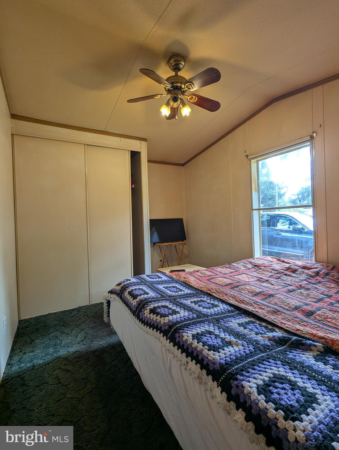 2525 Baltimore Boulevard Finksburg, MD 21048 - Photo 23 of 25 a bedroom with a large bed and a chandelier