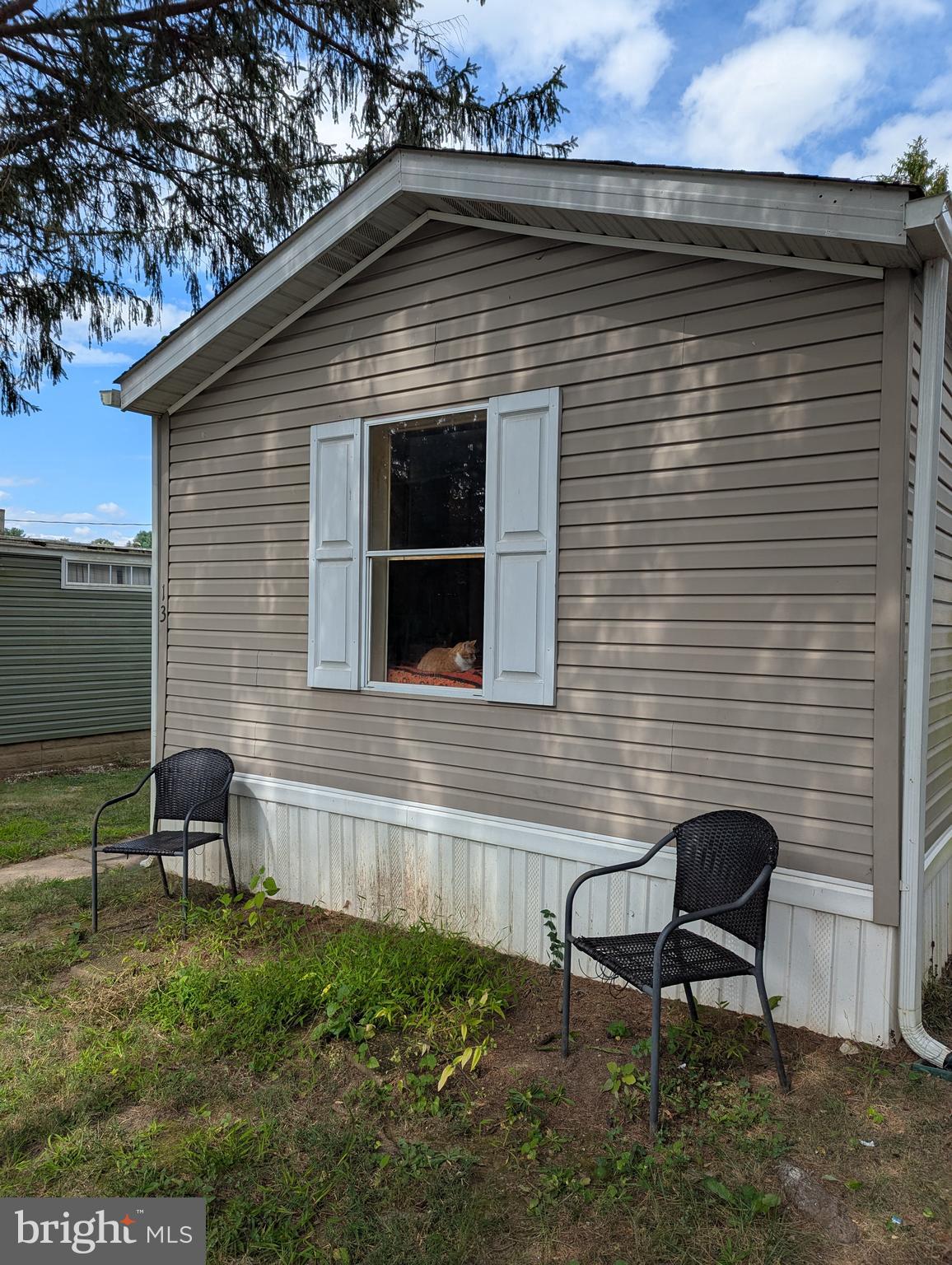 2525 Baltimore Boulevard Finksburg, MD 21048 - Photo 3 of 25 a backyard of a house with table and chairs