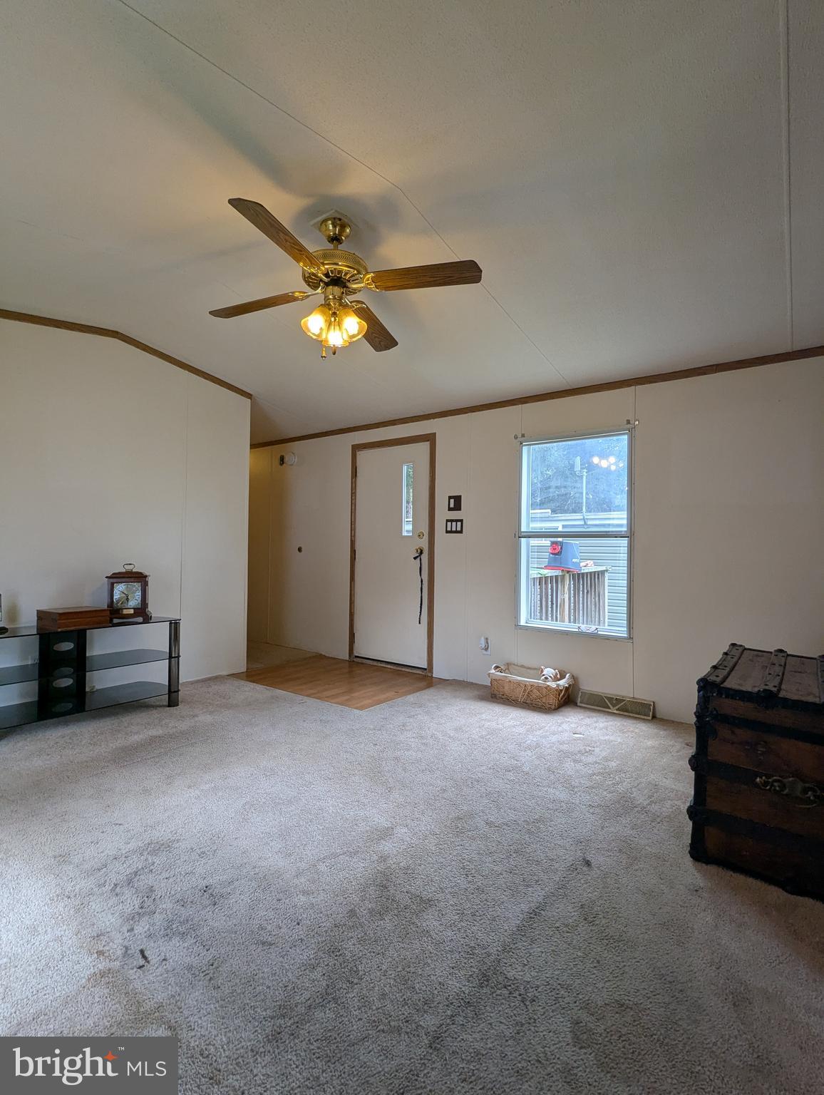 2525 Baltimore Boulevard Finksburg, MD 21048 - Photo 7 of 25 an empty room with windows and ceiling fan
