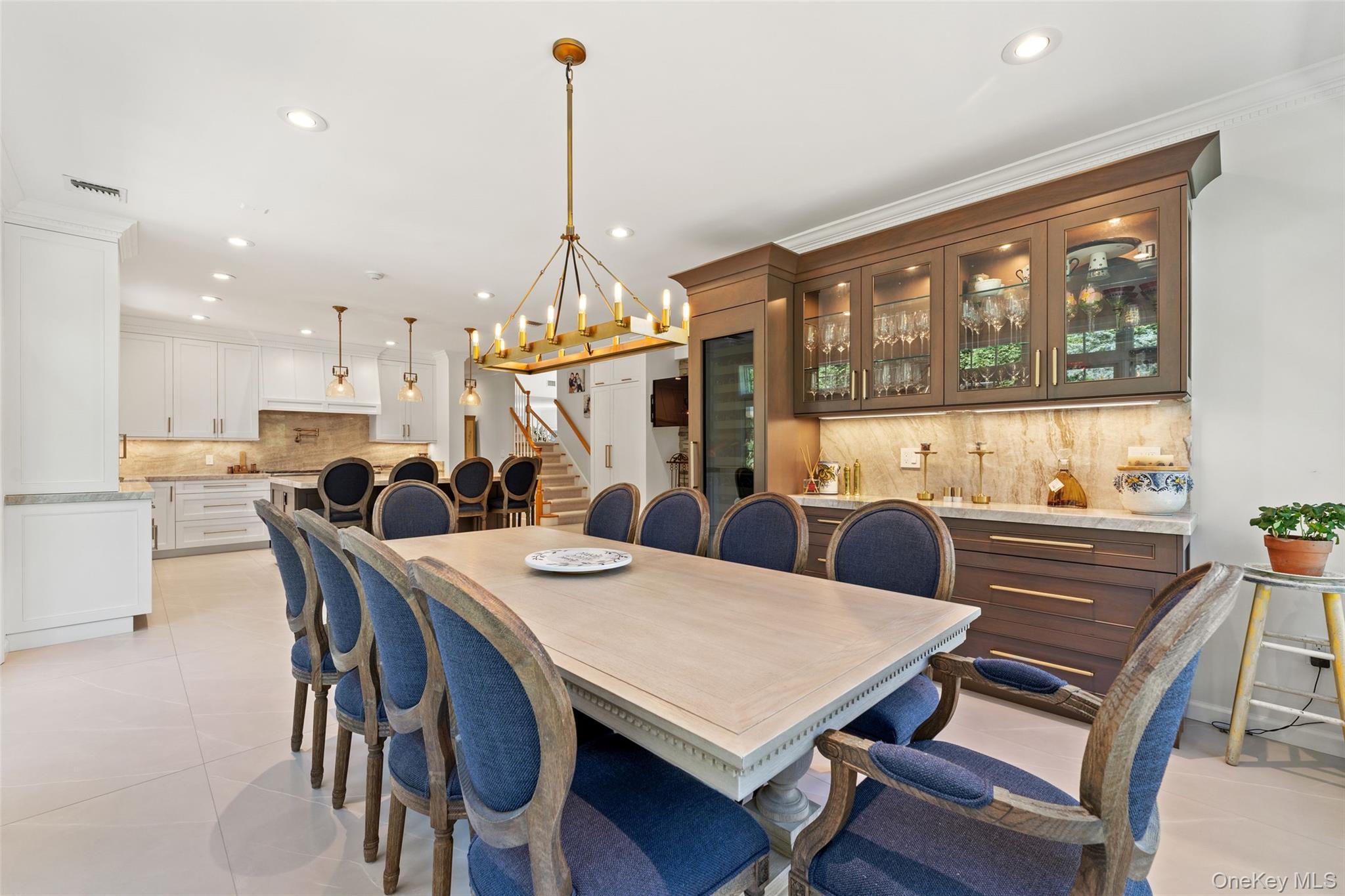 22 Perrin's Peak Road Stony Point, NY 10980 - Photo 34 of 47 Dining room featuring recessed lighting, a chandelier, light tile patterned flooring, stairs, and ornamental molding