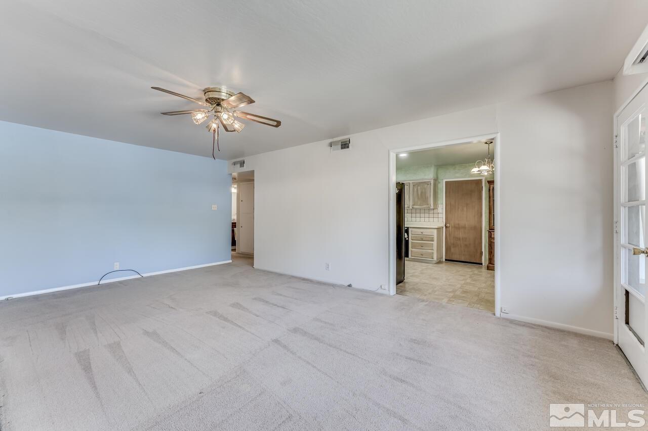 1935 Brisbane Avenue Reno, NV 89503 - Photo 16 of 38 an empty room with fan and a ceiling fan