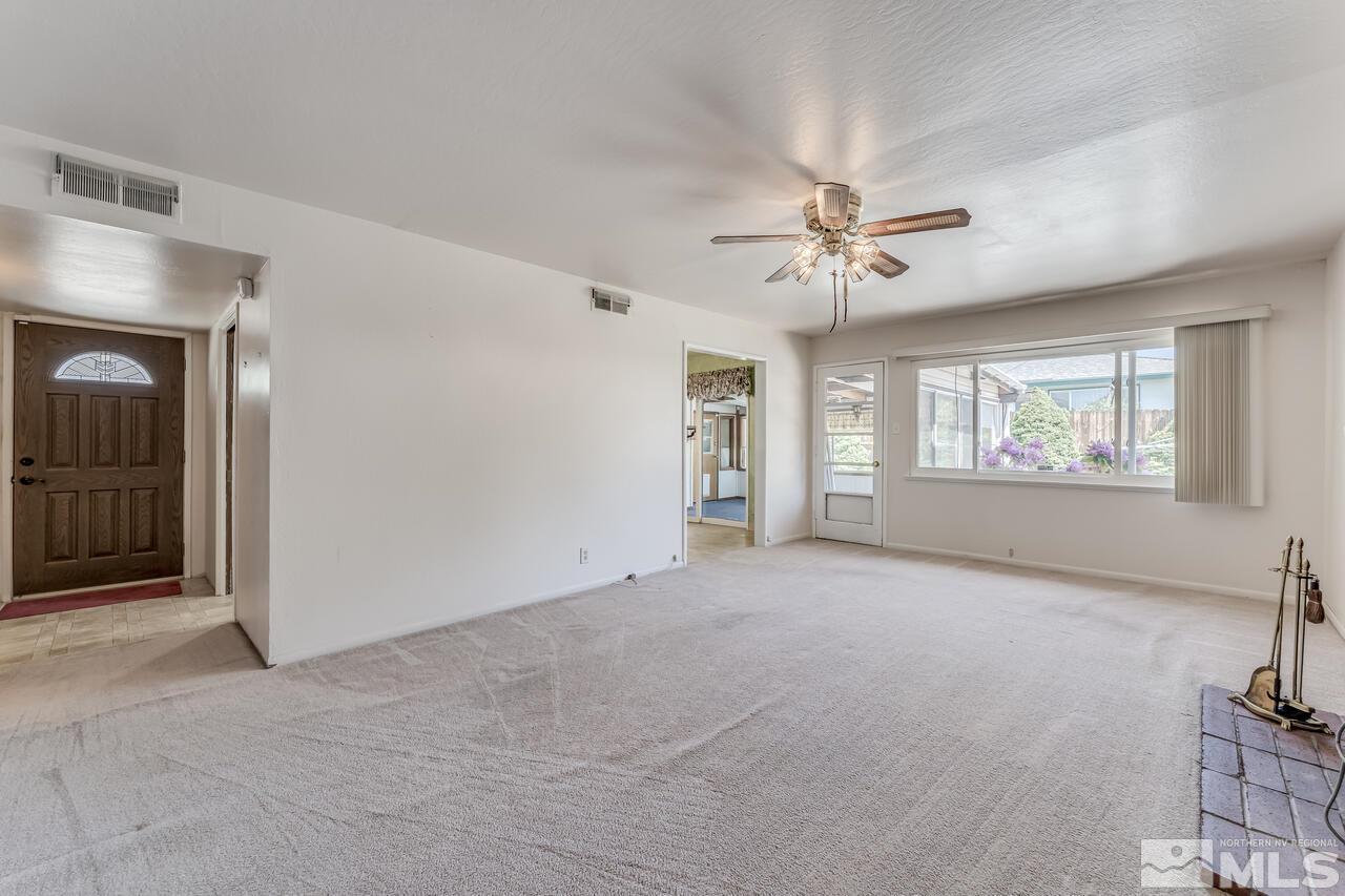 1935 Brisbane Avenue Reno, NV 89503 - Photo 17 of 38 a view of an empty room with a window