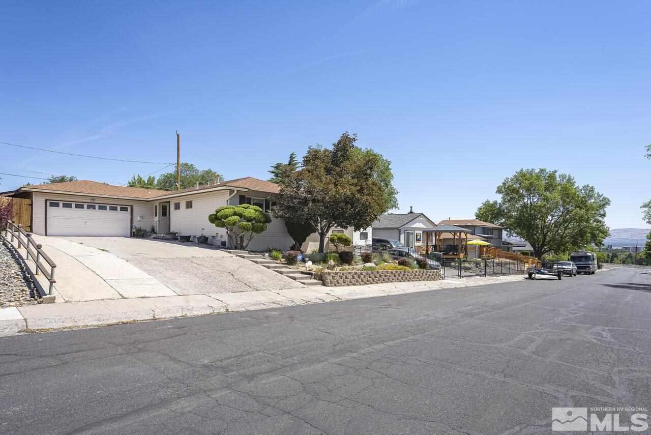 1935 Brisbane Avenue Reno, NV 89503 - Photo 2 of 38 a view of a street with a car parked in front of it