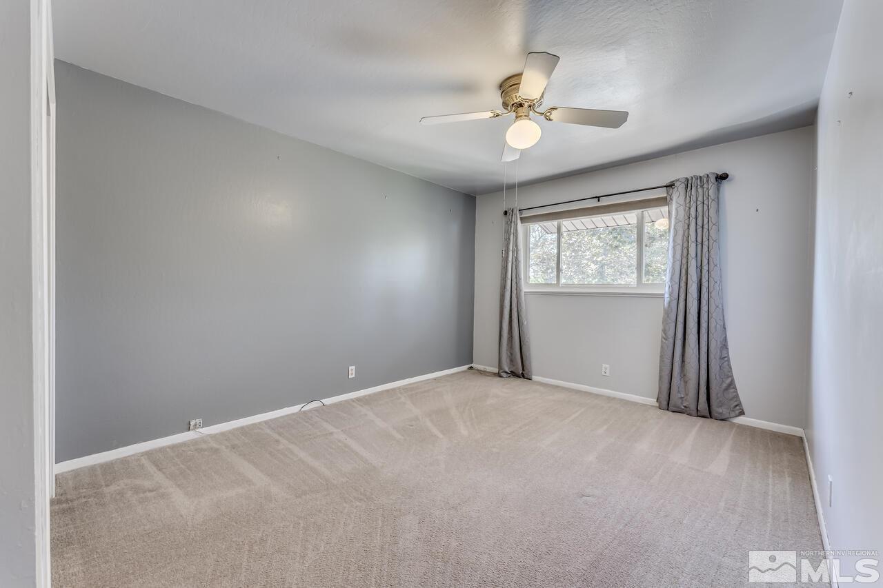 1935 Brisbane Avenue Reno, NV 89503 - Photo 23 of 38 a view of an empty room with a window