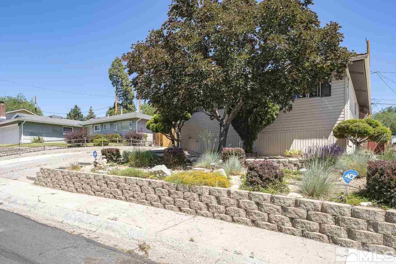 1935 Brisbane Avenue Reno, NV 89503 - Photo 4 of 38 front view of a house with a patio