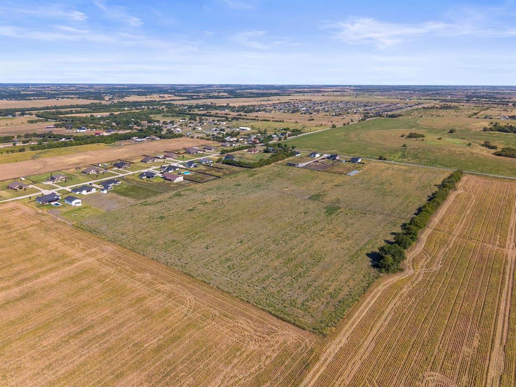 3885 Lois Road West Sanger, TX 76266 - Photo 9 of 12 Expansive parcel featuring open fields and established residential areas nearby