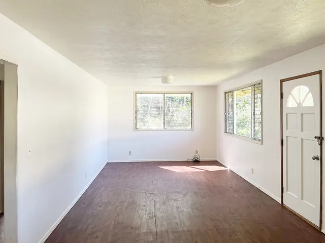 an empty room with windows