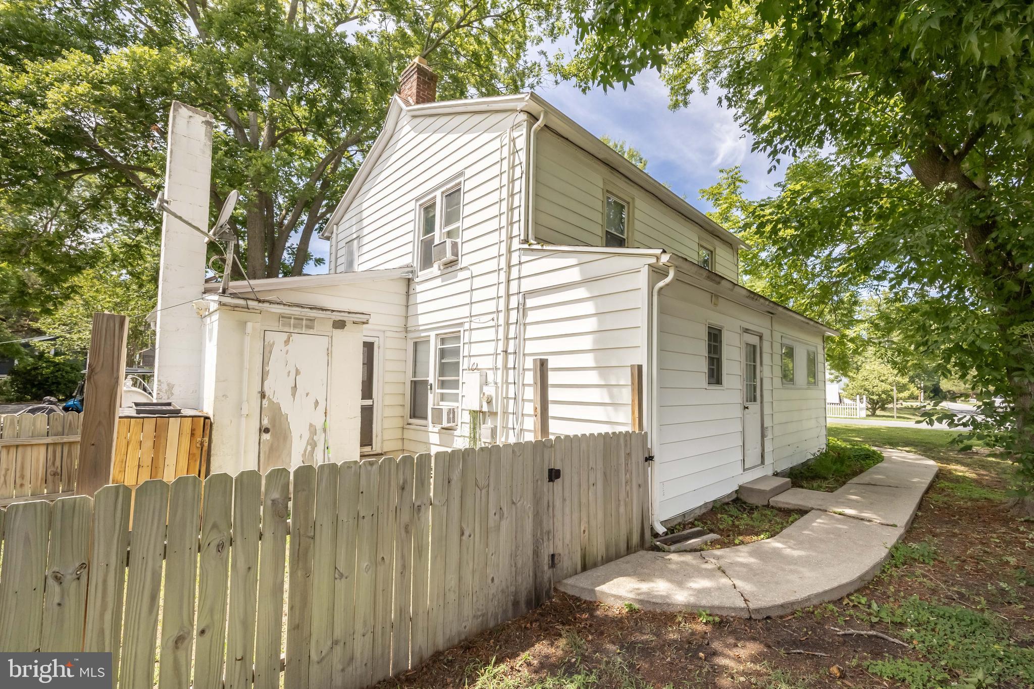 26467 Mariners Road Crisfield, MD 21817 - Photo 41 of 44 a view of a house with a yard