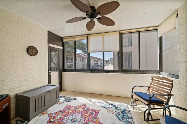 a view of a lake with a yard in front of it