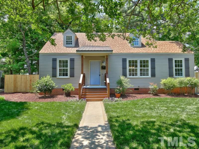 311 Colleton Road Raleigh, NC 27610 - Photo 1 of 22 a front view of a house with a yard