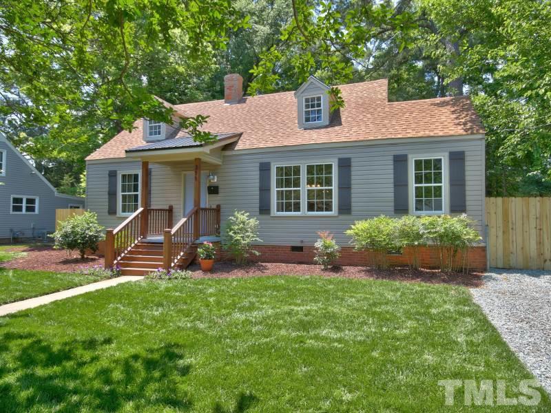 311 Colleton Road Raleigh, NC 27610 - Photo 2 of 22 a view of a house with a yard and sitting area