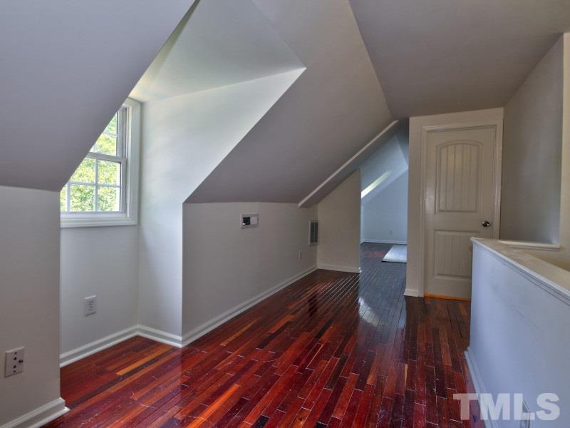 311 Colleton Road Raleigh, NC 27610 - Photo 15 of 22 a view of entryway with wooden floor