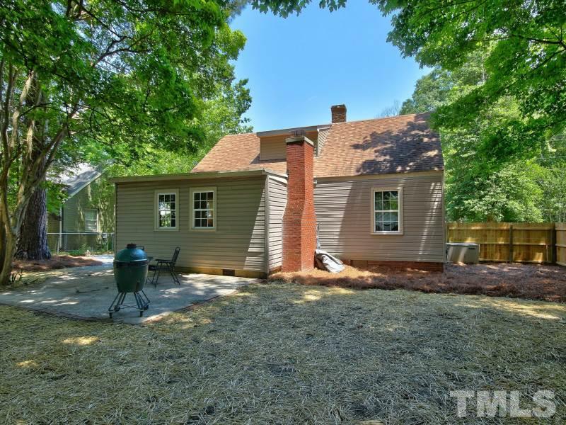 311 Colleton Road Raleigh, NC 27610 - Photo 21 of 22 a backyard of a house with seating space