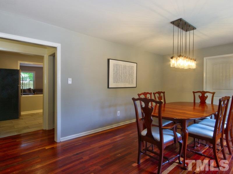 311 Colleton Road Raleigh, NC 27610 - Photo 6 of 22 a dining room with furniture and window