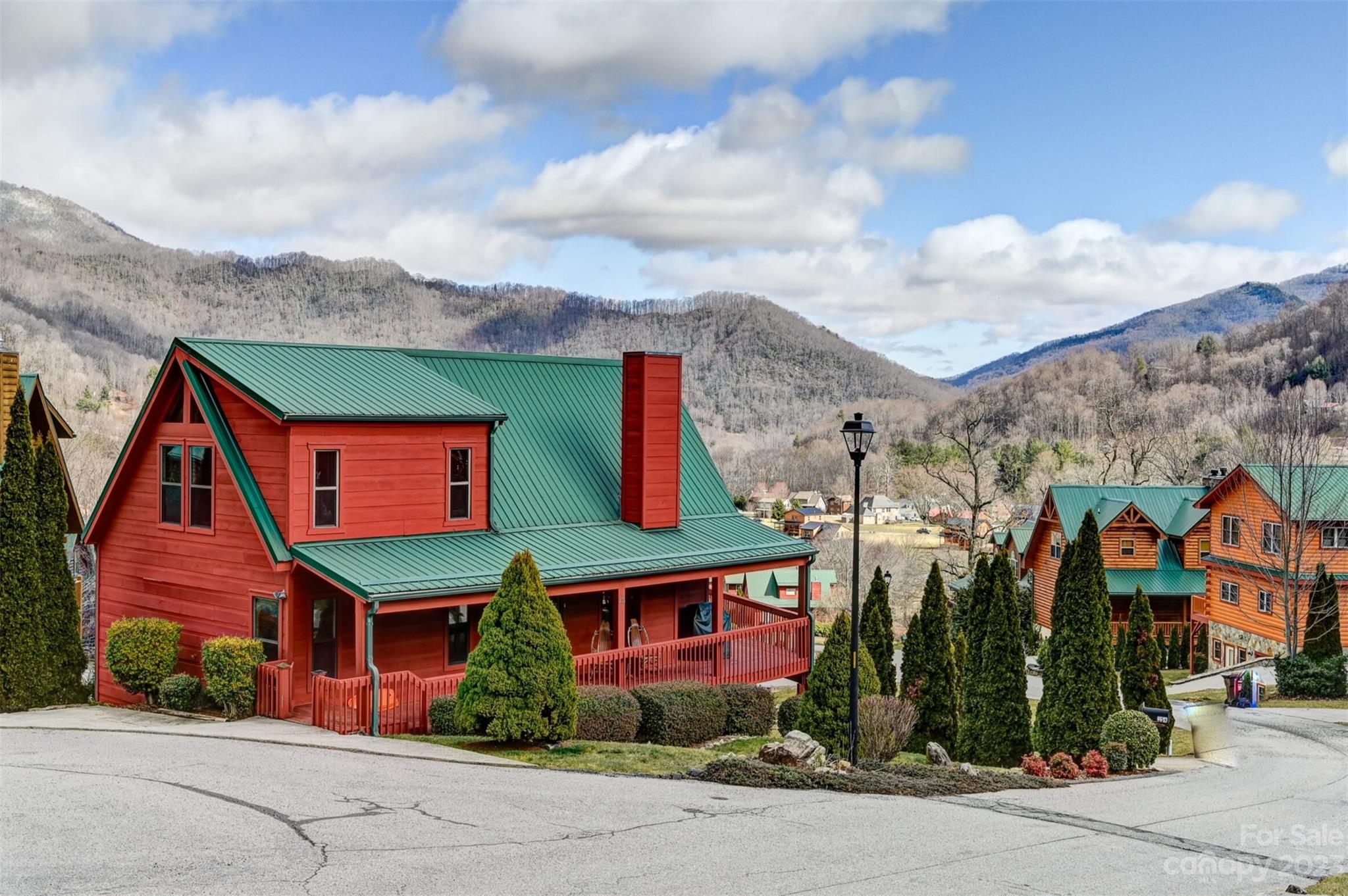356 Panoramic Loop Maggie Valley, NC 28751 - Photo 1 of 24 an aerial view of multiple houses