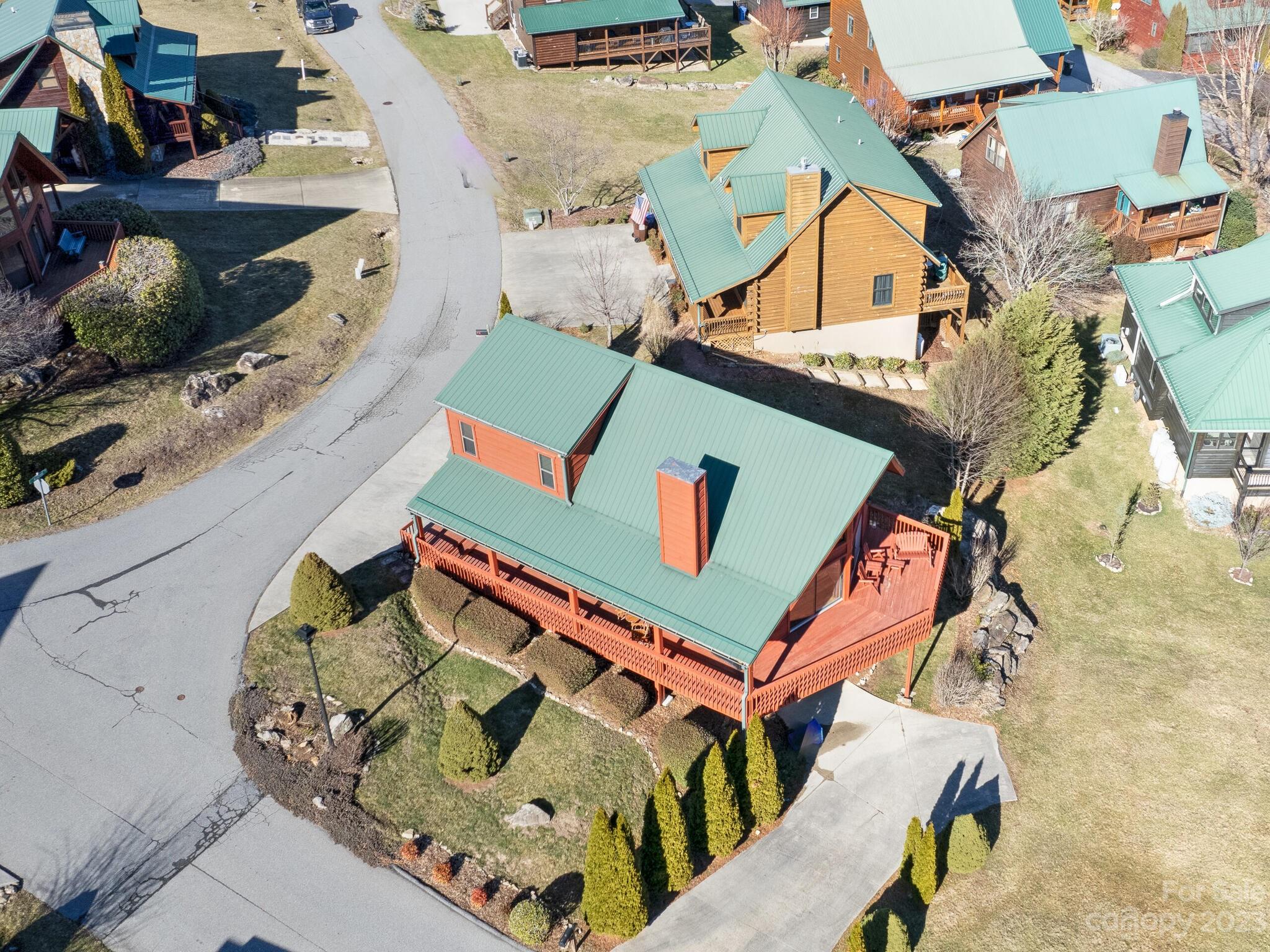 356 Panoramic Loop Maggie Valley, NC 28751 - Photo 20 of 24 an aerial view of a house with a swimming pool