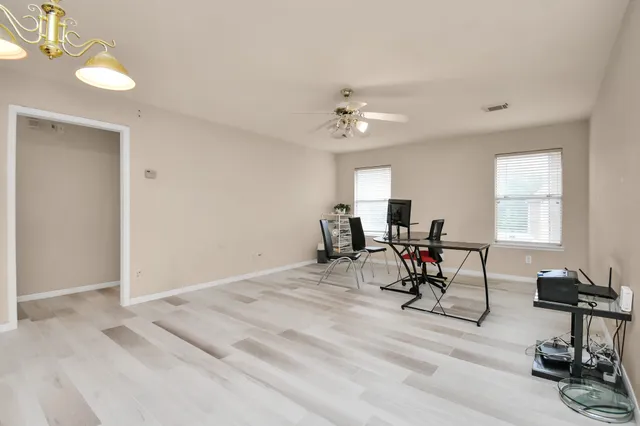 a bathroom with a double vanity sink and mirror