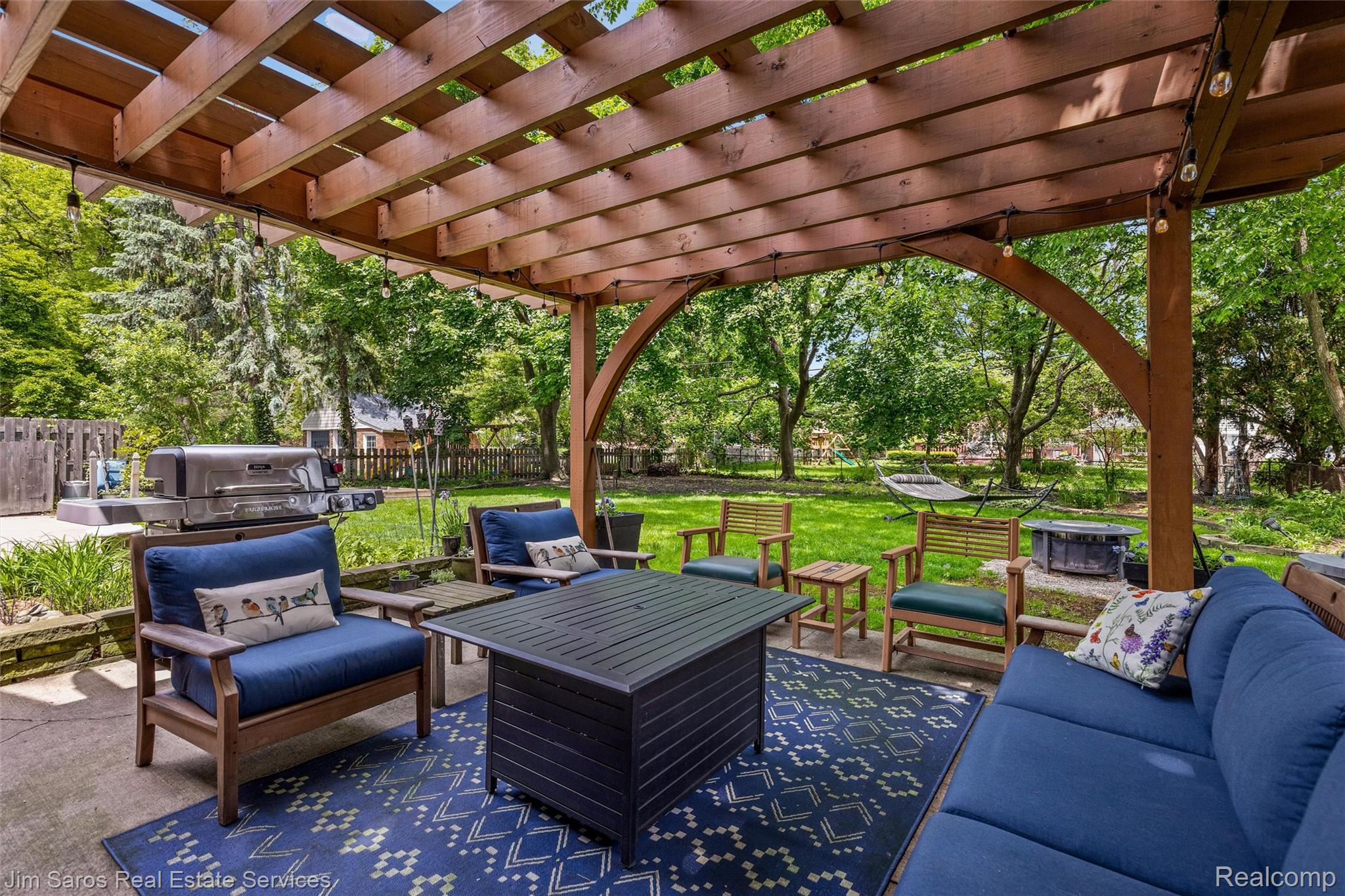 820 Westchester Road Grosse Pointe, MI 48230 - Photo 3 of 33 Fenced backyard with an outdoor living space, a pergola, and a patio area