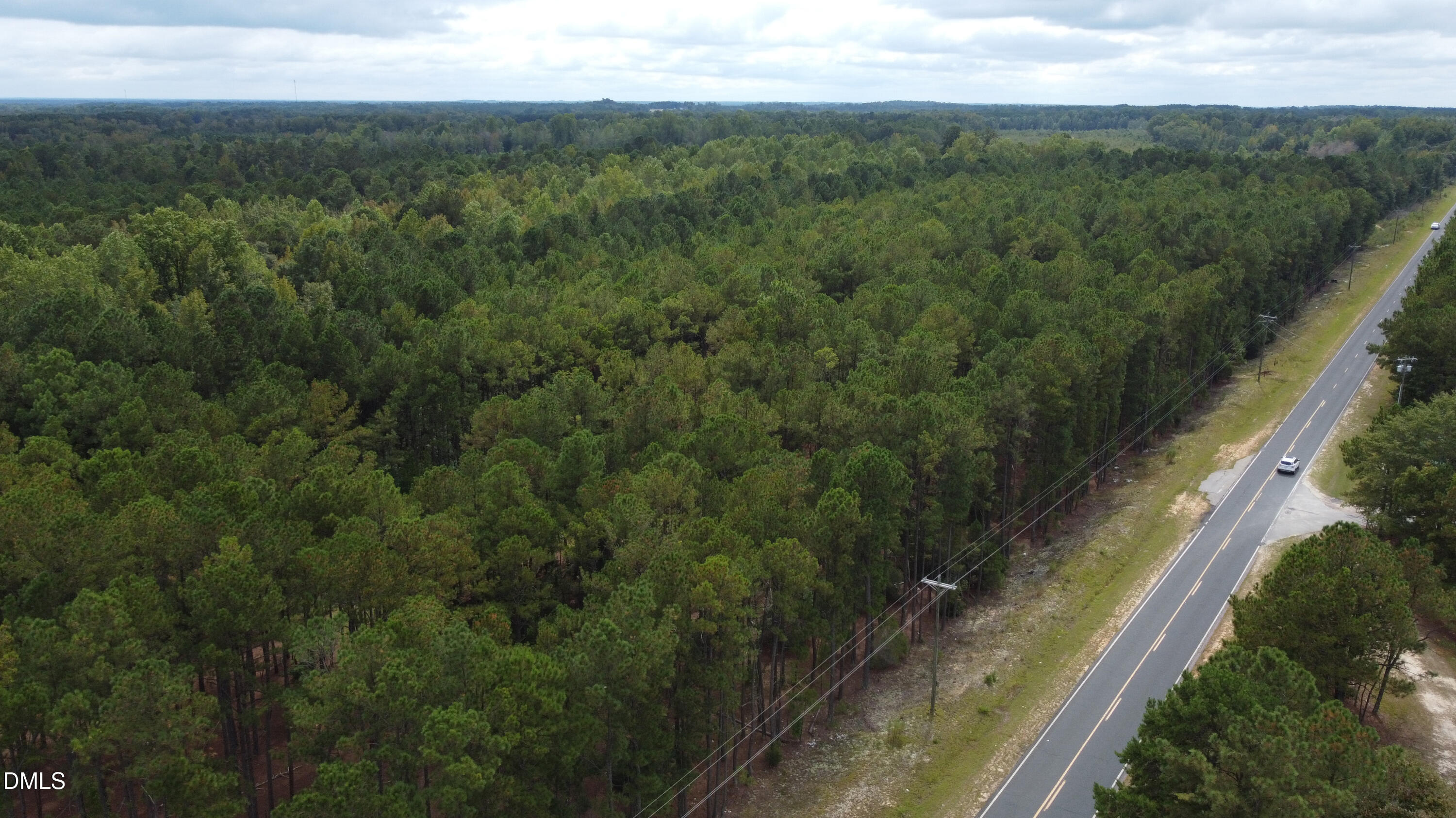0 Sanderfer Road Bunnlevel, NC 28323 - Photo 3 of 9 a view of a city from a balcony