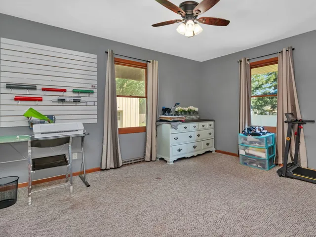 a room with furniture and a window