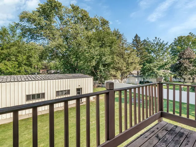 a workspace with furniture and a window
