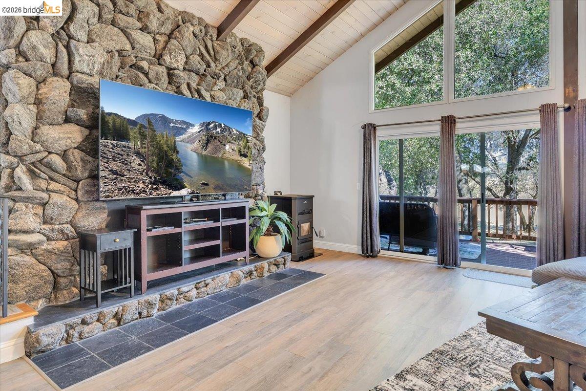 8733 Fraguero Road Sonora, CA 95370 - Photo 23 of 73 Vaulted ceiling with exposed wood beams