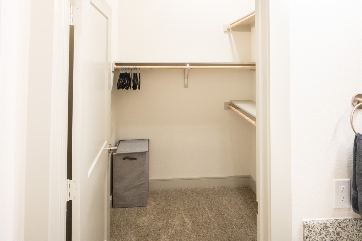 3100 Scofield Ridge Parkway, Unit 1204 Austin, TX 78727 - Photo 5 of 21 a view of walk in closet with empty racks